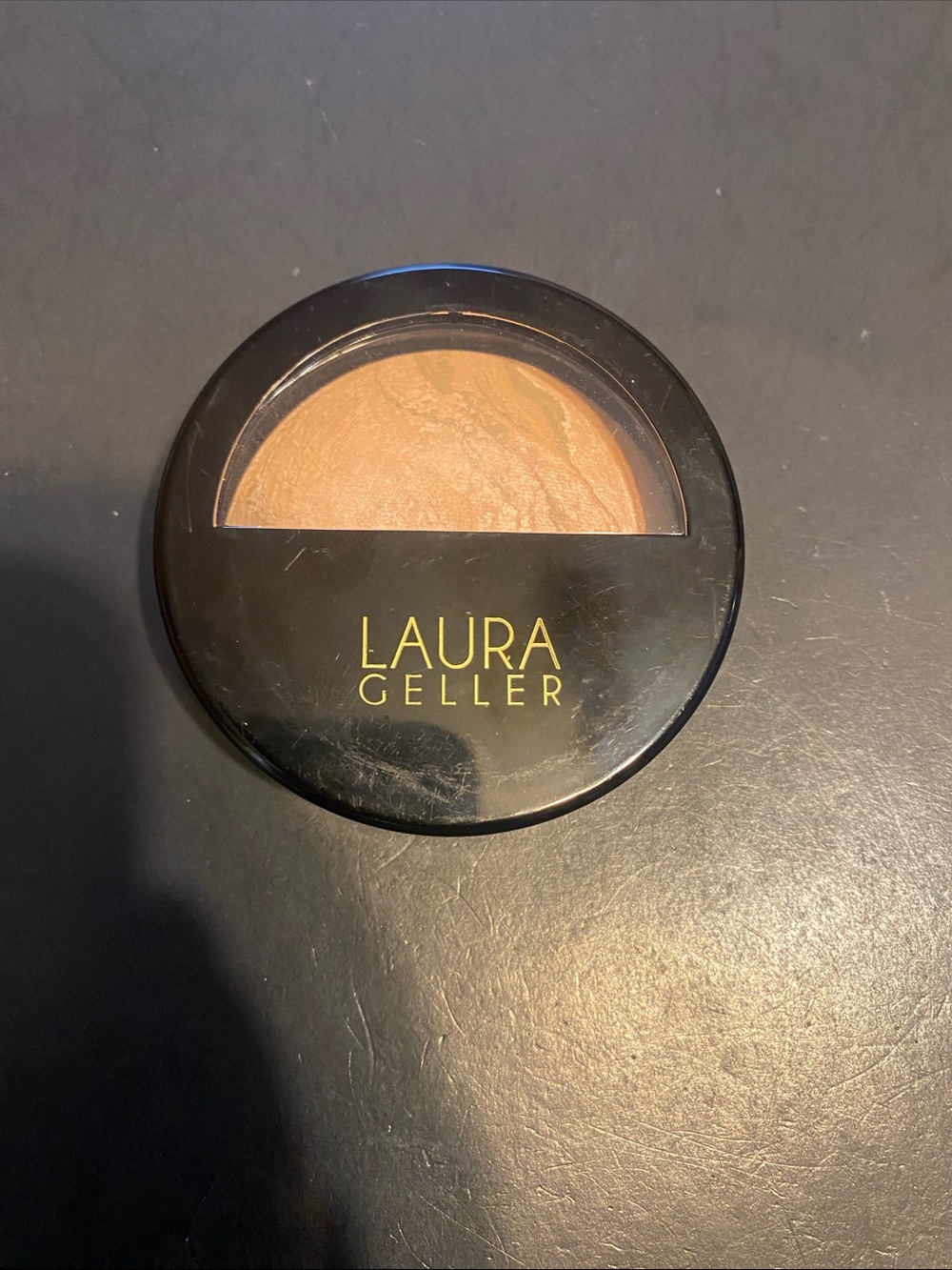 This item is a Laura Geller Baked Balance-N-Brighten Color Correcting Foundation